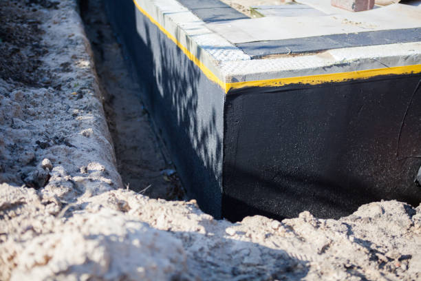 Professional Waterproofing technician working in Sanders, KY